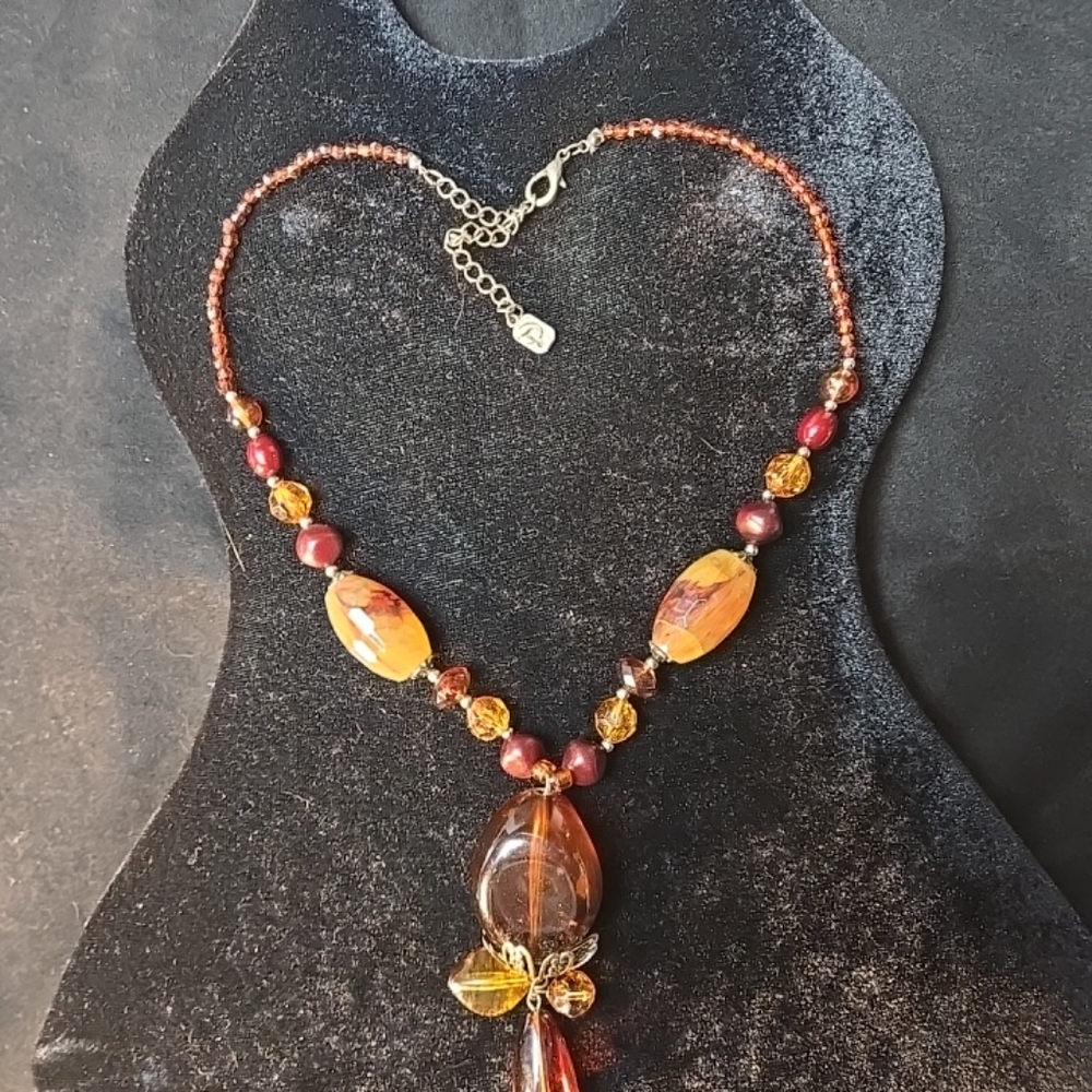 You&I, Amber and Jasper beaded necklace UV test shown